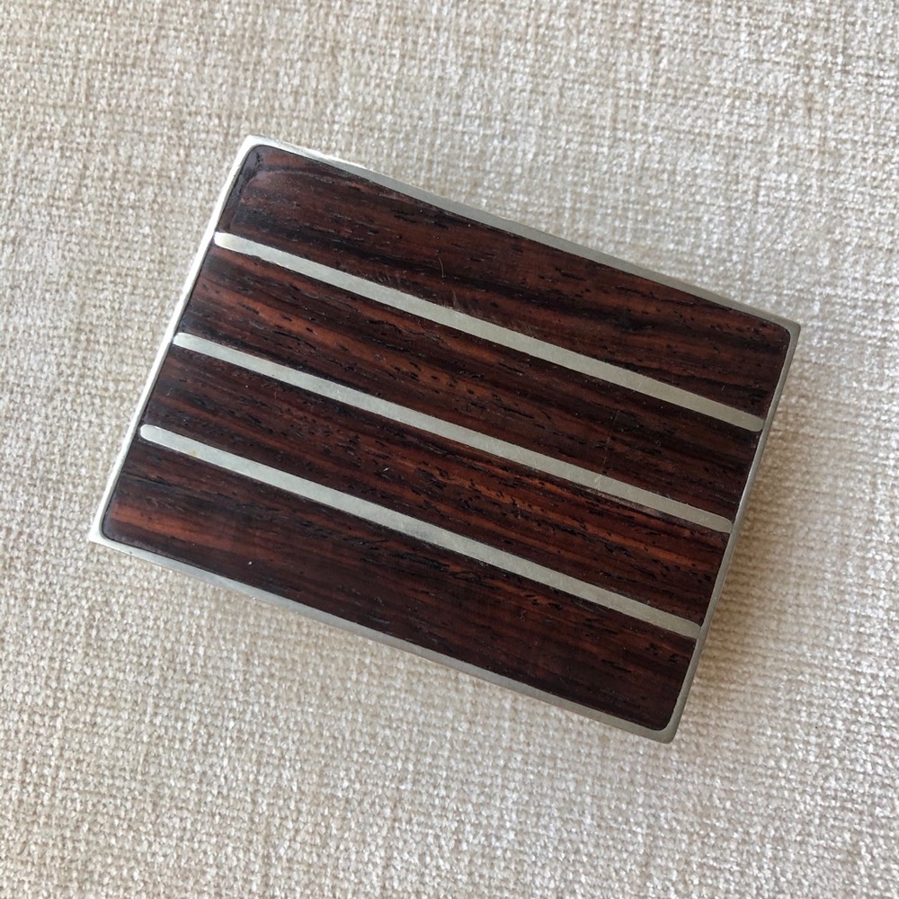 Ironwood detail silver belt buckle
